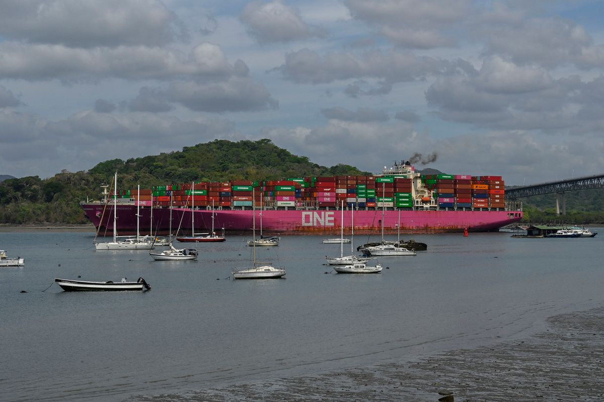 A ship navigates through the Panama Canal in the area near the Americas' Bridge in Panama City on April 24, 2023. The scarcity of rainfall due to global warming has forced the Panama Canal to reduce the draft of ships passing through the interoceanic waterway, in the midst of a water supply crisis that threatens the future of this maritime route. The Alhajuela lake, in the Colon province, 50 km north of Panama City, is one of the main lakes that supplies water to the locks of the Panama Canal and is at its lowest level of recent years. 