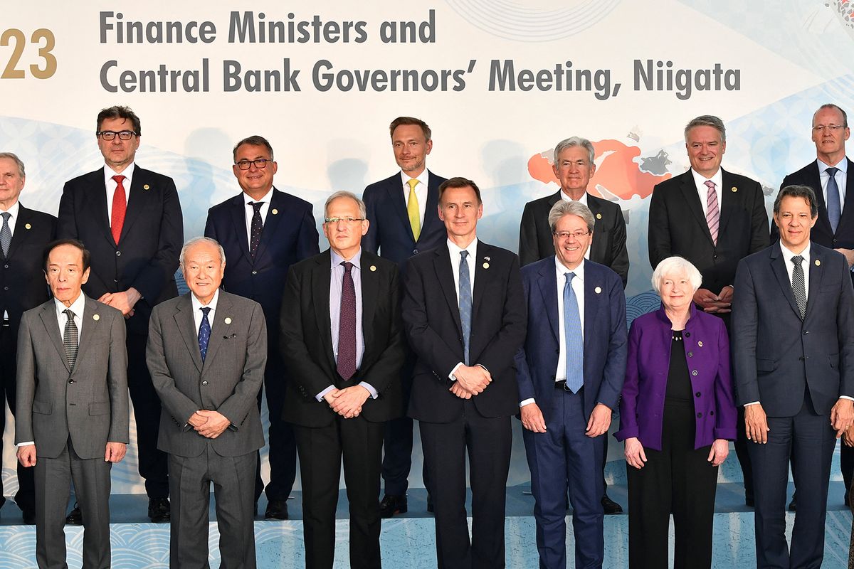 (Front row, L-R) Bank of Japan Governor Kazuo Ueda, Japan's Finance Minister Shunichi Suzuki, Bank of England Deputy Governor Jon Cunliffe, Britain's Chancellor of the Exchequer Jeremy Hunt, European Commission Commissioner for the Economy Paolo Gentiloni, US Treasury Secretary Janet Yellen, Brazil's Finance Minister Fernando Haddad, (top row, L-R) Bank of Italy Governor Ignazio Visco, Itlay's Economy and Finance Minister Giancarlo Giorgetti, Germany's Deutsche Bundesbank President Joachim Nagel, Germany's Finance Minister Christian Lindner, US Chair of the Board of Governors of the Federal Reserve System Jerome Powell, Secretary-General of the Organisation for Economic Co-operation and Development Mathias Corman, and Chair of the Financial Stability Board Klaas Knot pose for a group photo, including invited participants from non-G7 countries, as part of the G7 Finance Ministers and Central Bank Governors' Meeting at Toki Messe in Niigata on May 12, 2023. (Photo by Kazuhiro NOGI / AFP)