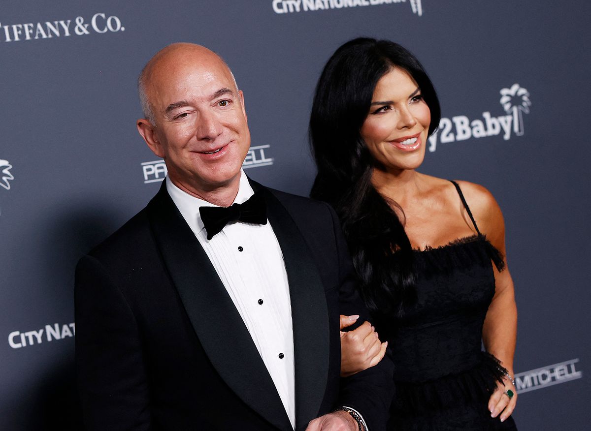 Jeff Bezos (L) and Lauren Sanchez (R) attend the Baby2Baby 10-Year Gala Presented By Paul Mitchell at the Pacific Design Center on November 13, 2021 in West Hollywood, California. (Photo by Michael Tran / AFP)