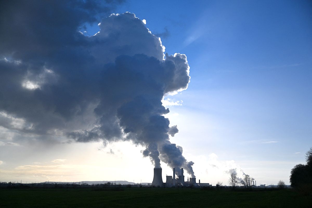 (FILES) In this file photo taken on January 17, 2023 huge clouds of steam come out of the chimneys of coal power plant in Niederaussem, western Germany. Air pollution causes more than 1,200 premature deaths a year in under 18's across Europe and increases the risk of disease later in life, the EU environmental agency said Monday. (Photo by INA FASSBENDER / AFP)