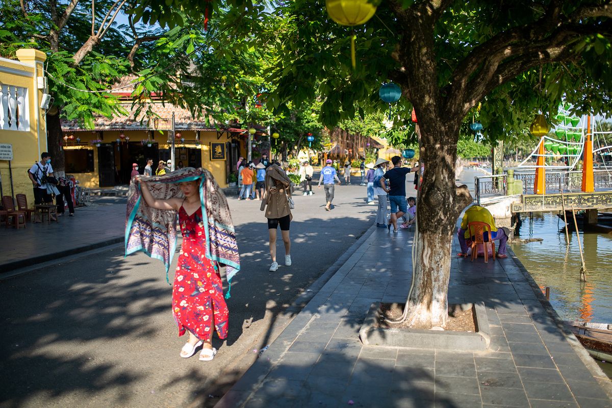Views of Hoi An Tourism
HOI AN, VIETNAM - MAY 14: A tourist pulls a shawl over her head to stay cool amid searing midday heat in Hoi An, Vietnam on May 14, 2022. Chris Humphrey / Anadolu Agency (Photo by Chris Humphrey / ANADOLU AGENCY / Anadolu Agency via AFP)