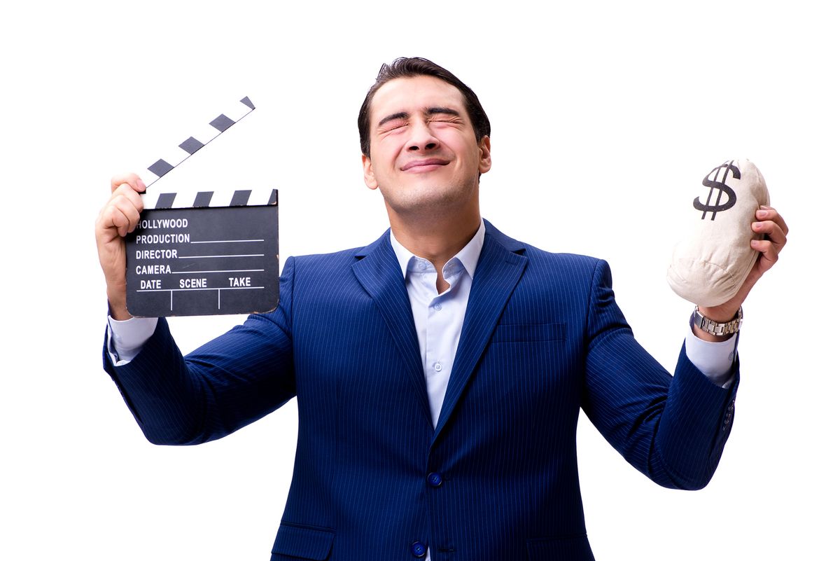 Handsome,Man,With,Movie,Clapper,Isolated,On,White