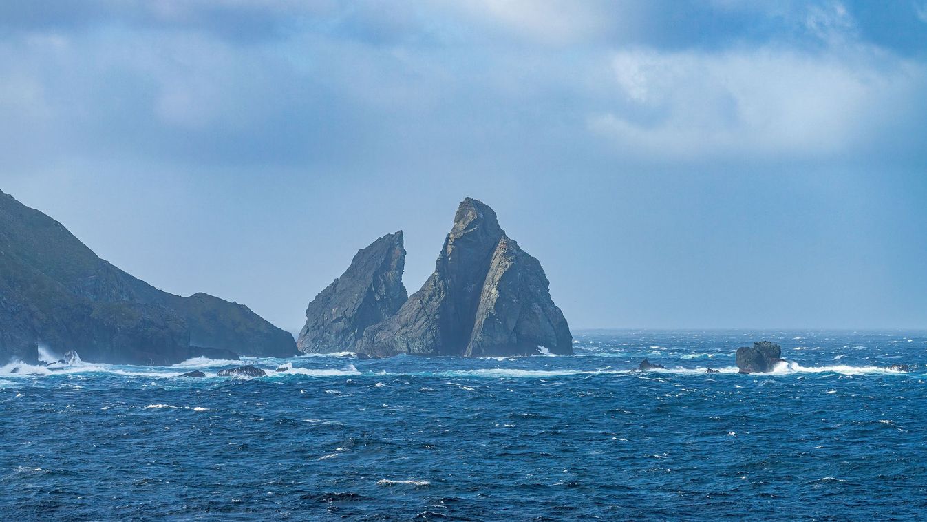 Jagged rocky outcroppings off Hornos Island near Cape Horn in Chile