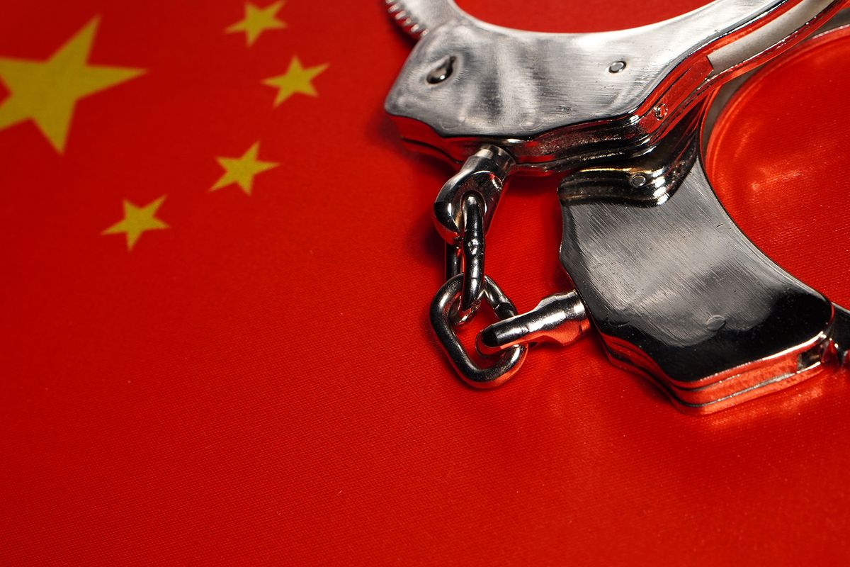 Handcuff,On,The,Flag,Of,China.,Close-up,,Copy,Space Handcuff on the flag of China. Close-up, copy space
ChatGPT