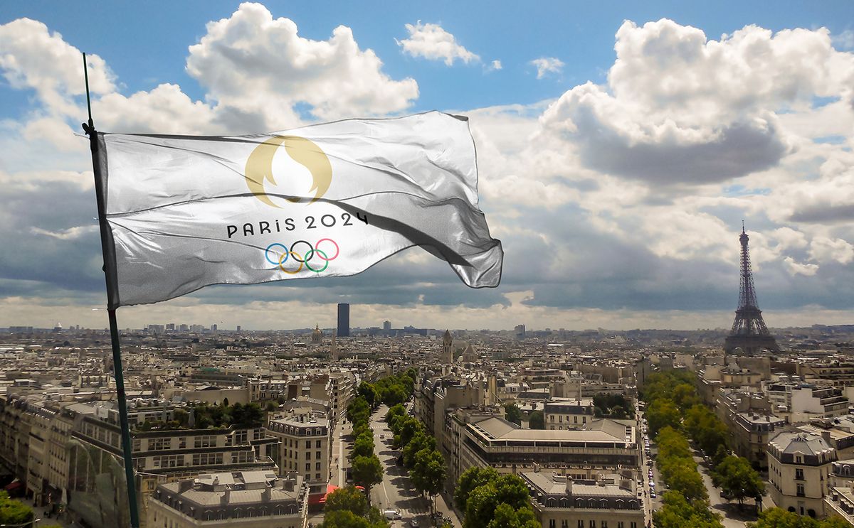PARIS, FRANCE, March 2023: Top view of flag of french olympics games 2024 with grunge texture. no flagpole. Plane design, layout. official logo of SOG 2024 in Paris
