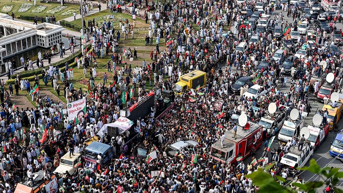 PAKISTAN-DEMONSTRATION-MAY-DAY-KHAN
Activists of Pakistan Tehreek-e-Insaf (PTI) party gather around the vehicle of former prime minister Imran Khan (inside c, vehicle) during a rally to mark the International Labour Day or May-Day in Lahore on May 1, 2023. (Photo by Arif ALI / AFP)