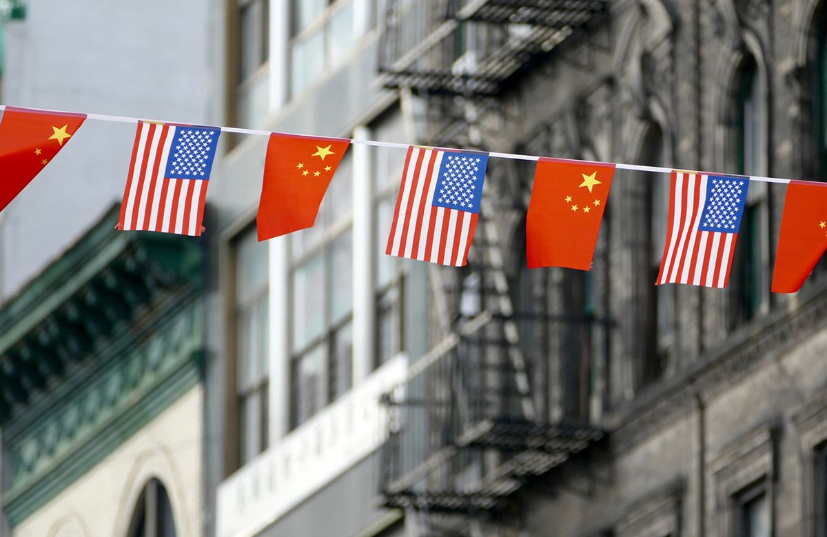 Flags of USA and China Hanging Next to Each Other in Chinatown, New York, USA