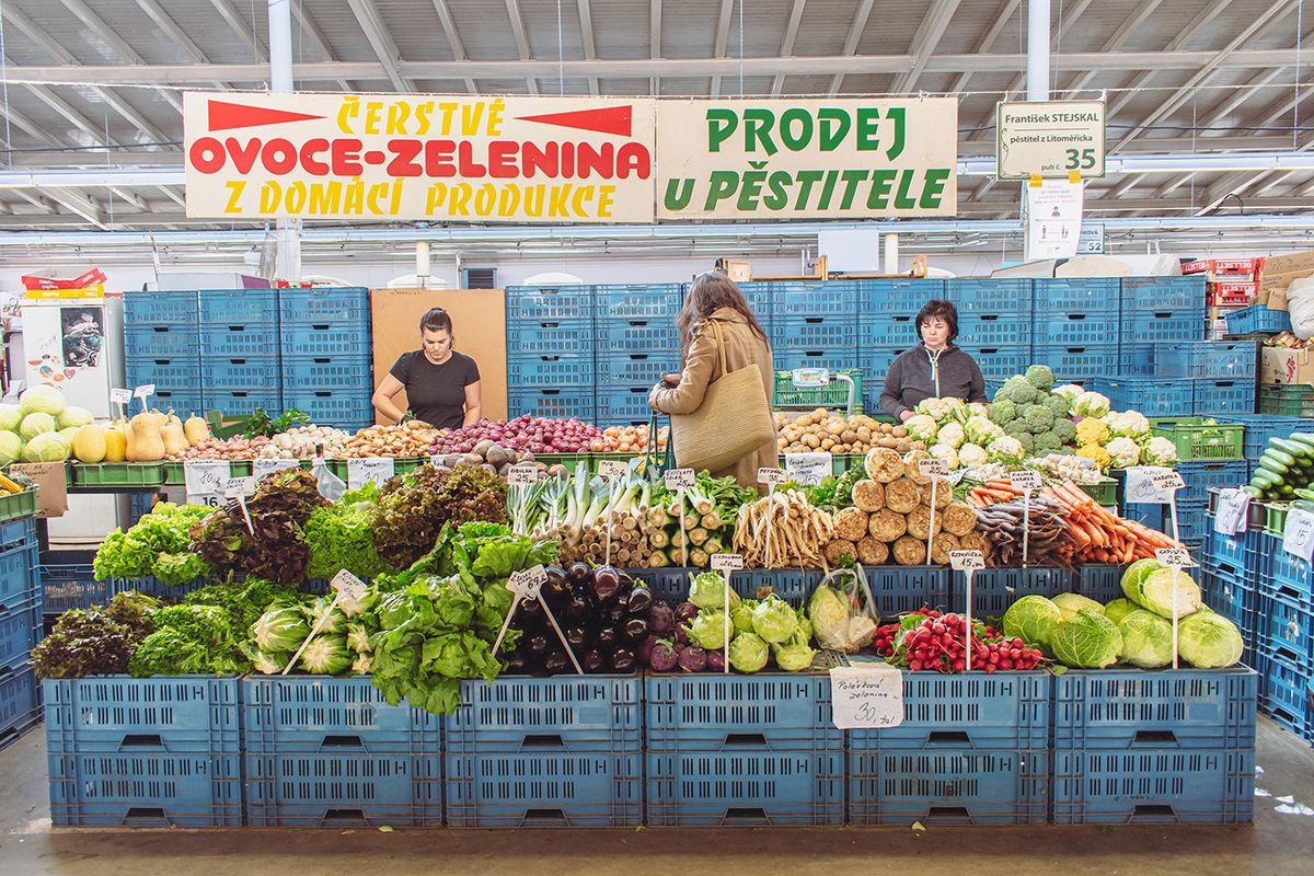Prague, Czech Republic - 10 1 2021: Shopping vegetable in Holesovice market in Prague. Local organic healthy czech veggies.