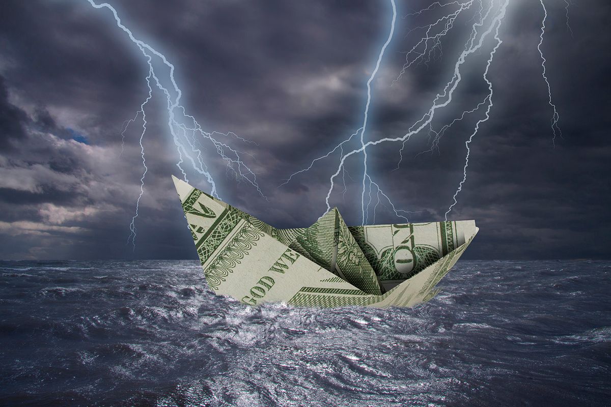 Paper boat made from a One Dollar note almost capsizes in high waves
Paper boat made from a One Dollar note almost capsizes in high waves and bolt of lightning over stormy dark sea during a thunder-storm with dramatic cloudscape. US economic problems concept.