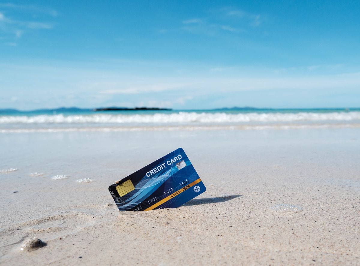 A,Blue,Credit,Card,Placed,On,A,Tropical,Beach