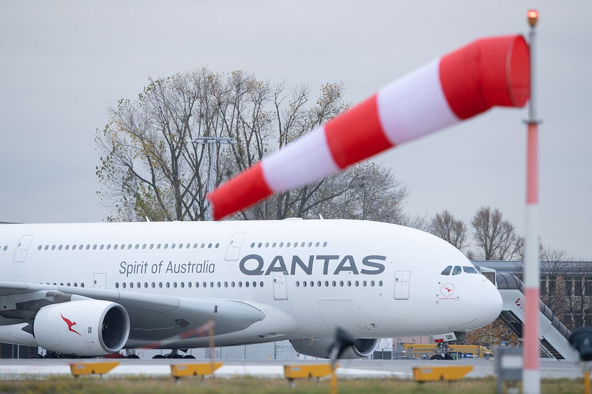 Aircraft A380 Dresden
08 November 2021, Saxony, Dresden: A Qantas Airways Airbus A380 stands behind a windsock before take-off at Dresden Airport. The aircraft will make the long-haul flight to Sydney after maintenance work at Elbe Flugzeugwerke (EFW). Photo: Sebastian Kahnert/dpa-Zentralbild/dpa (Photo by Sebastian Kahnert / dpa-Zentralbild / dpa Picture-Alliance via AFP)