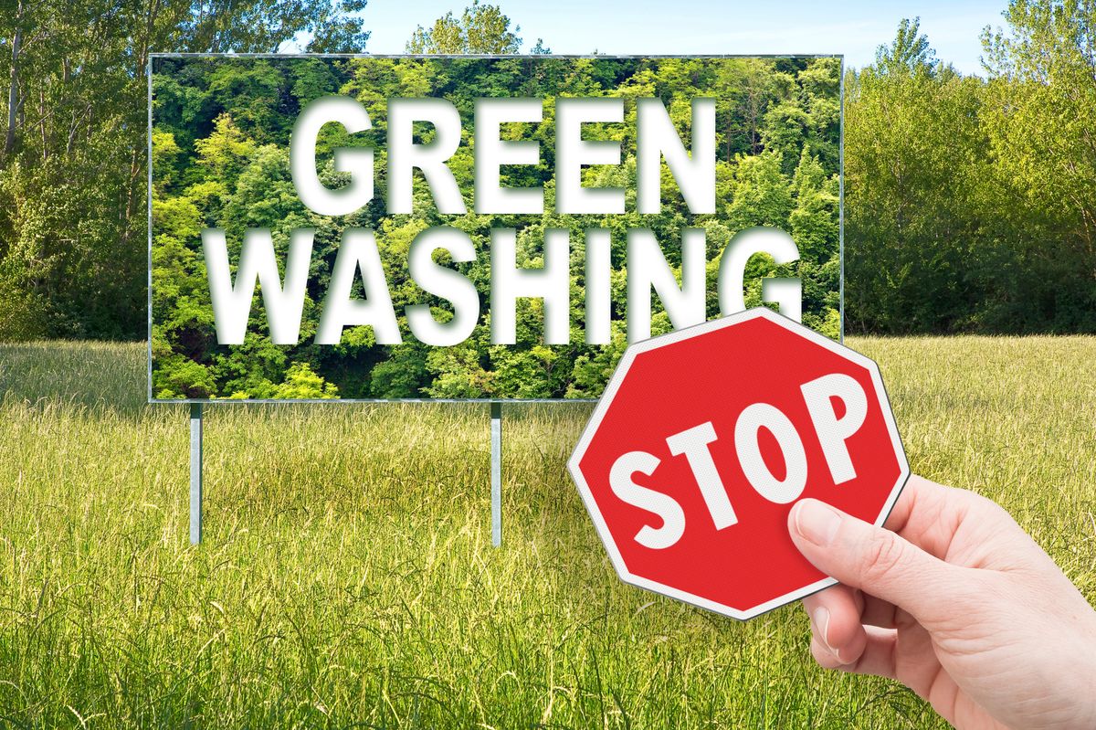 Stop,Greenwashing,Concept,With,Advertising,Signboard,In,A,Rural,Scene