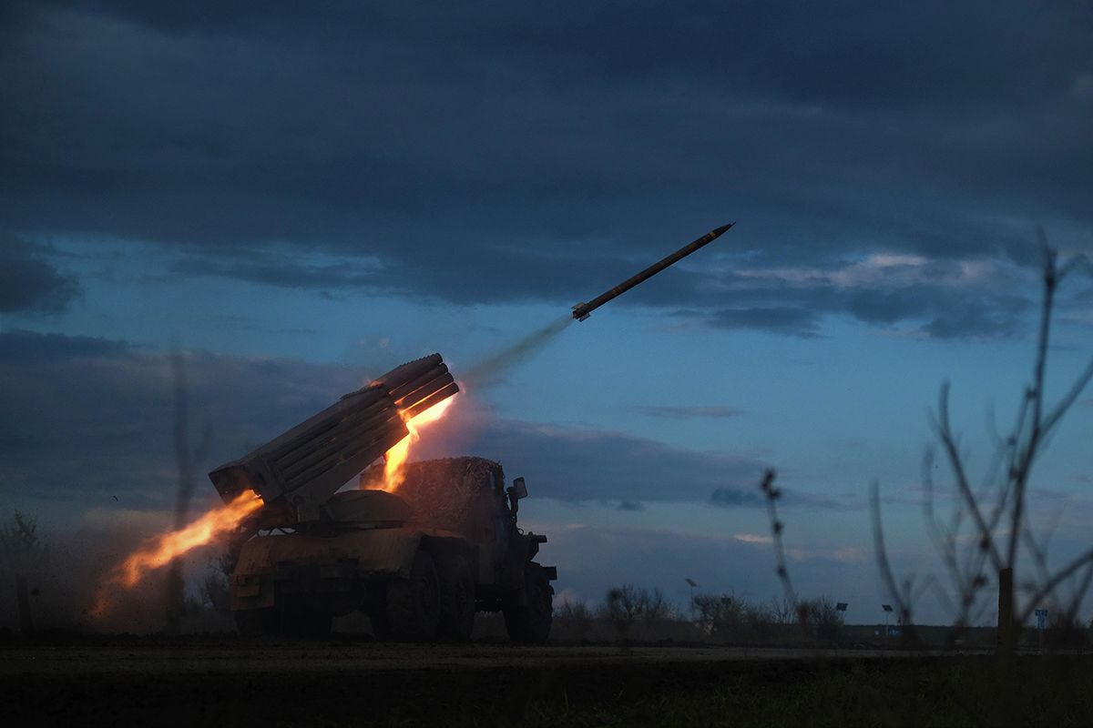 A BM-21 Grad multiple rocket launcher fires towards Russian positions on the frontline near Bakhmut, Donetsk region, on April 23, 2023, amid the Russian invasion on Ukraine. (Photo by Sergey SHESTAK / AFP)