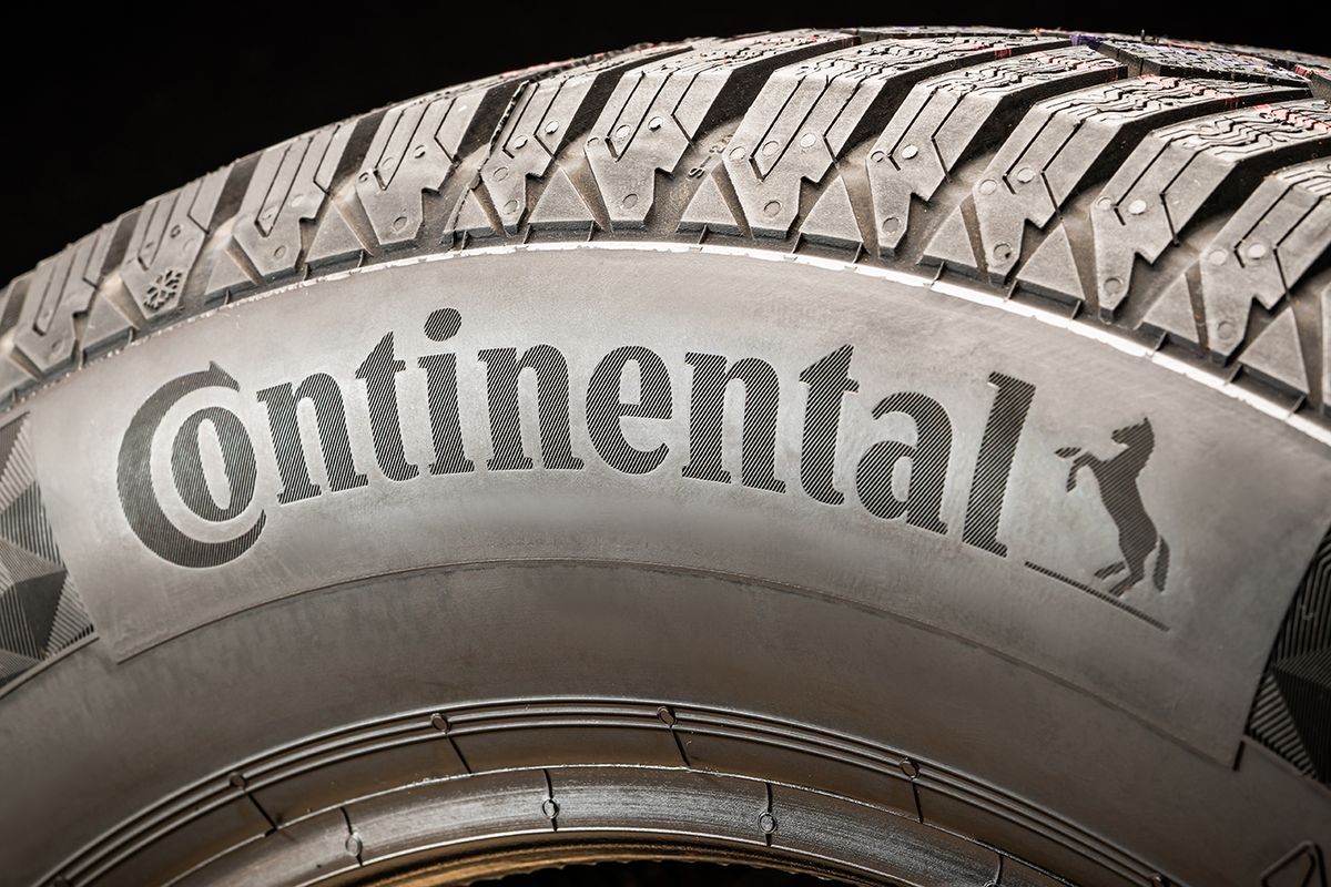 Continental logo on the side of the tire. world tire group. black background