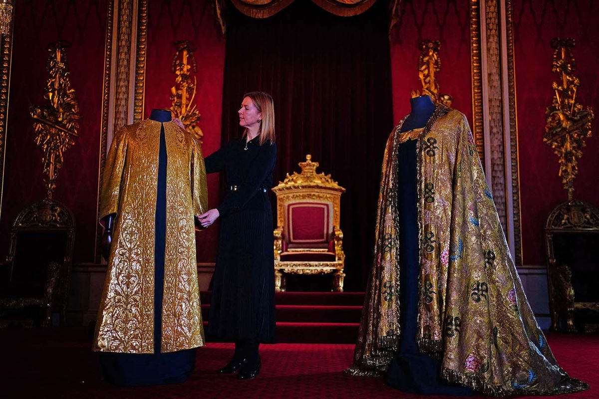 King Charles III coronation
EMBARGOED TO 2200 BST MONDAY MAY 1The Coronation Vestments, comprising of the Supertunica (L) and the Imperial Mantle (R) are displayed in the Throne Room at Buckingham Palace in London on April 26, 2023. - The vestments will be worn by Britain's King Charles III during his coronation at Westminster Abbey on May 6. (Photo by Victoria Jones / POOL / AFP)
BRITAIN-ROYALS-CORONATION-KING-PREPARATIONS