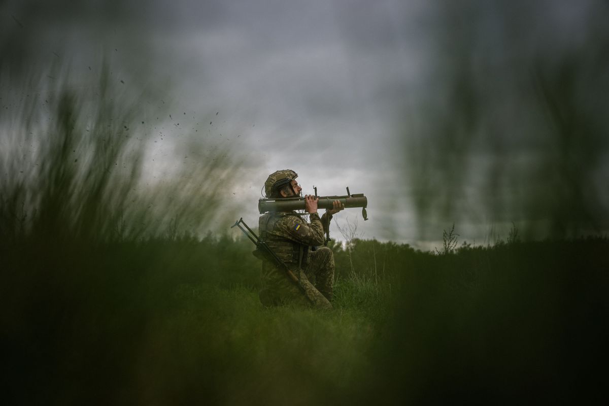 A Ukrainian serviceman fires a rocket launcher during a military training exercise in the Kharkiv region on May 1, 2023, amid the Russian invasion of Ukraine. 