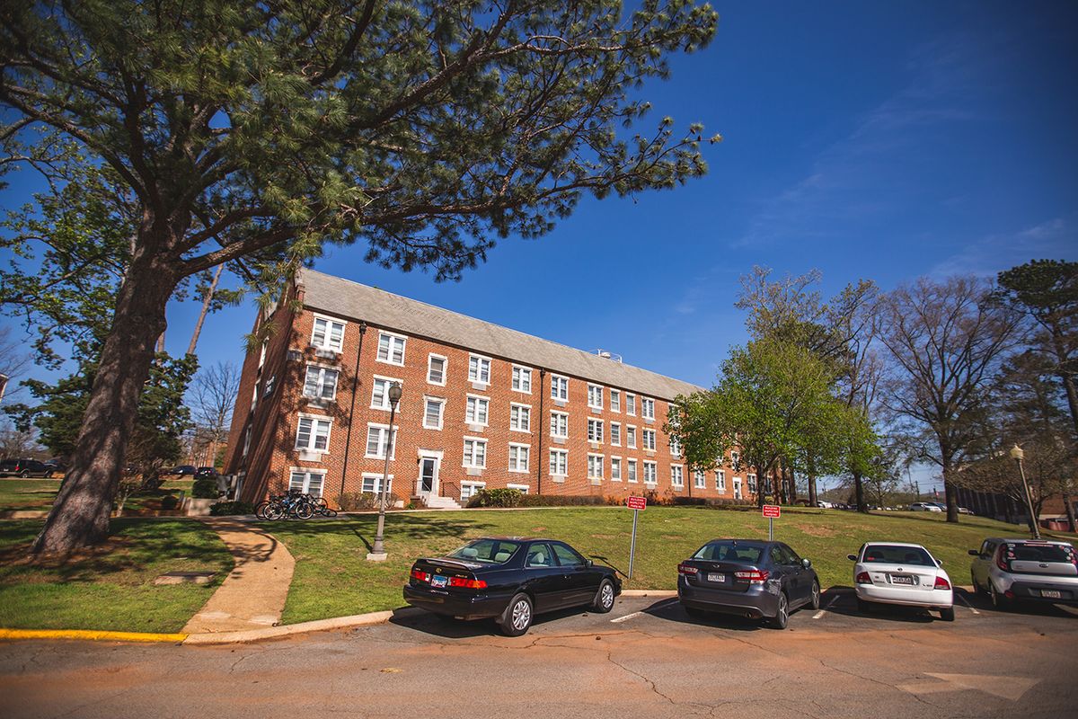 Jacksonville, AL, USA - April 1st, 2023: Building and parking area on the college campus of Jacksonville State University