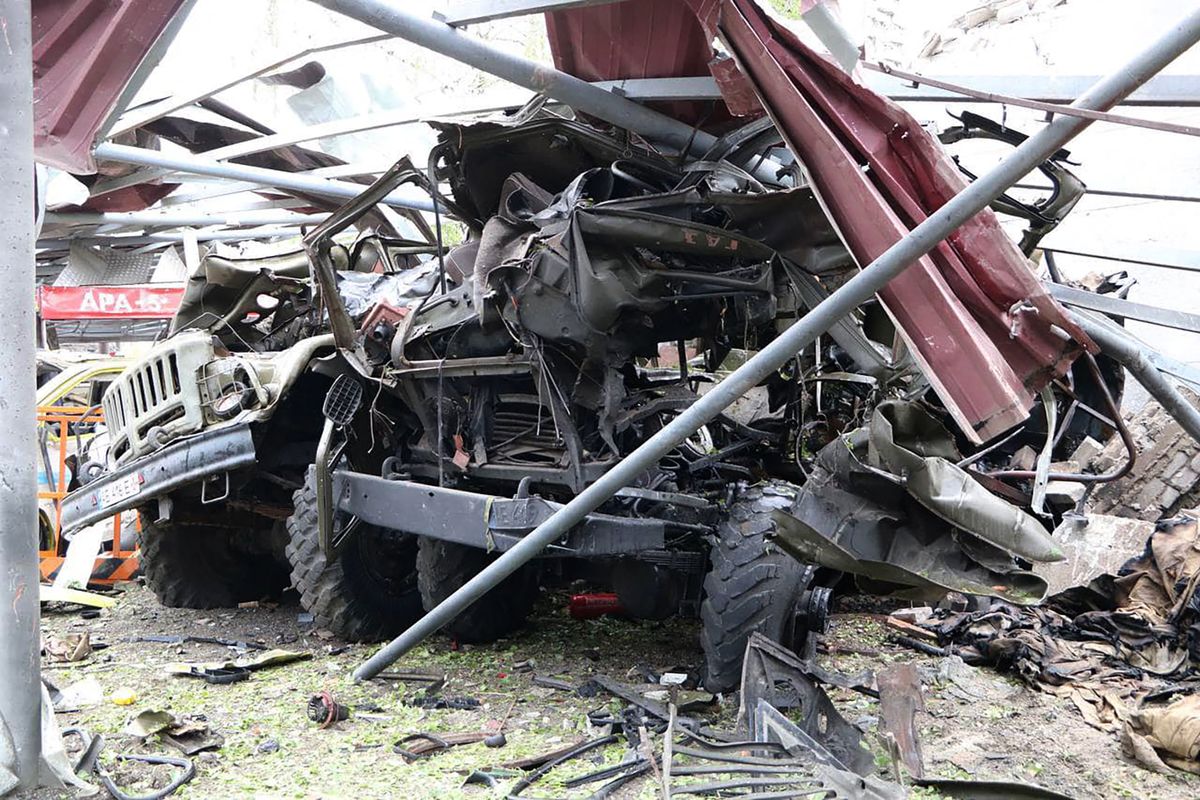 This handout picture published by the State Emergency Service of Ukraine on May 22, 2023, shows a fire station with roof blown off and damaged fire engines after a strike in the eastern Ukrainian city of Dnipro, amid the Russian invasion of Ukraine. According to the emergency services, one of its rescuers was injured while three of its buildings and more than 20 pieces of equipment were destroyed. Russian forces targeted the eastern Ukrainian city of Dnipro overnight with 16 missiles and 20 attack drones, claims the Ukrainian army. 