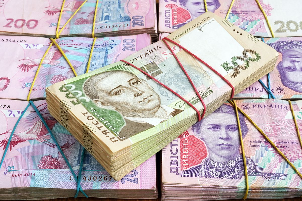 Stacks of Ukrainian hryvnia UAH banknotes. The money of Ukraine.
