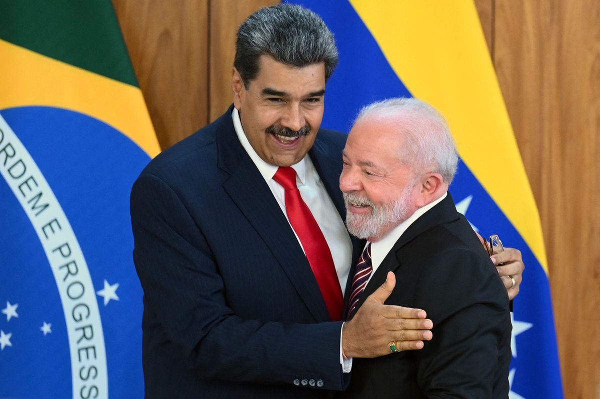 BRAZIL-VENEZUELA-DIPLOMACY-LULA DA SILVA-MADURO
Venezuela's President Nicolas Maduro (L) and Brazil's President Luiz Inacio Lula da Silva (R) greet each other after a joint press conference at the Planalto Palace in Brasilia on May 29, 2023. Brazilian President Luiz Inacio Lula da Silva met Monday with his Venezuelan counterpart Nicolas Maduro, renewing a relationship severed under far-right ex-president Jair Bolsonaro. Lula invited Maduro to the Brazilian capital along with the rest of South America's leaders for a "retreat" Tuesday aimed at rebooting regional cooperation. It will be the first regional summit in nearly a decade. (Photo by EVARISTO SA / AFP)