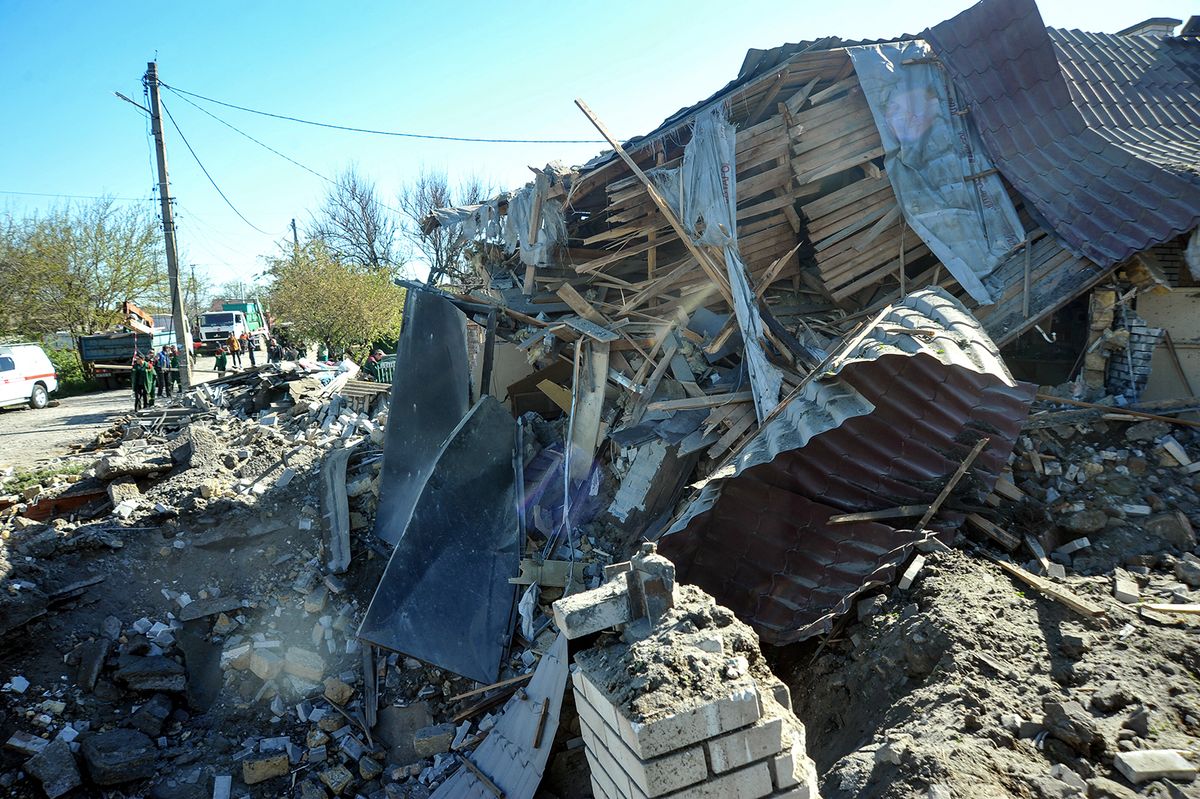 Russian troops strike residential area in Zaporizhzhia
ZAPORIZHZHIA, UKRAINE - MAY 3, 2023 - Damage caused by Russian troops firing S-300 missiles is pictured in a residential area of Zaporizhzhia, southeastern Ukraine. As a result of the night missile attack on Zaporizhzhia, nine people sought medical help. They refused to be hospitalized. NO USE RUSSIA. NO USE BELARUS. (Photo by Albert Koshelev / NurPhoto / NurPhoto via AFP)