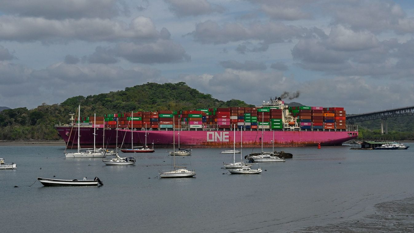 A ship navigates through the Panama Canal in the area near the Americas' Bridge in Panama City on April 24, 2023. The scarcity of rainfall due to global warming has forced the Panama Canal to reduce the draft of ships passing through the interoceanic waterway, in the midst of a water supply crisis that threatens the future of this maritime route. The Alhajuela lake, in the Colon province, 50 km north of Panama City, is one of the main lakes that supplies water to the locks of the Panama Canal and is at its lowest level of recent years. 