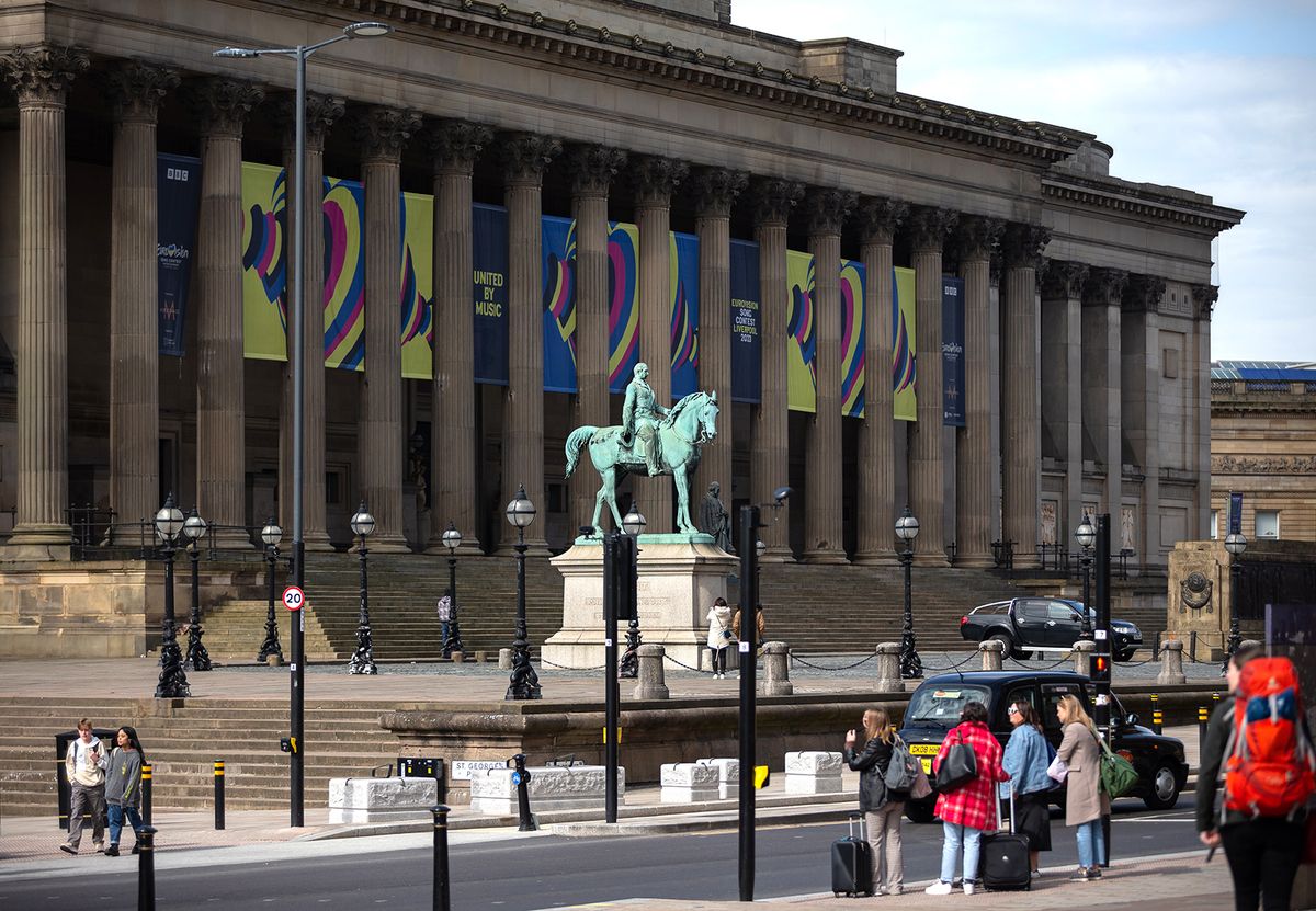 Liverpool is host for the Eurovision Song Contest 2023 epa10558483 Eurovision branded banners adorn St. George’s Hall, the venue for the ‘Big Eurovision Welcome’, an open-air live show which will herald the start of the Eurovision Song Contest in Liverpool, Britain, 04 April 2023. Liverpool is hosting the 2023 Eurovision Song Contest on behalf of Ukraine due to ongoing conflict with Russia. The ESC will take place from 09 to 13 May 2023. Liverpool is a port city in the North West of England which rose to prominence due to its shipping links during the Industrial Revolution. Liverpool is now a tourist destination, noted for its music, culture and arts venues as well as being home to two Premier League football clubs.  EPA/ADAM VAUGHAN epa10558483 Eurovision branded banners adorn St. George’s Hall, the venue for the ‘Big Eurovision Welcome’, an open-air live show which will herald the start of the Eurovision Song Contest in Liverpool, Britain, 04 April 2023. Liverpool is hosting the 2023 Eurovision Song Contest on behalf of Ukraine due to ongoing conflict with Russia. The ESC will take place from 09 to 13 May 2023. Liverpool is a port city in the North West of England which rose to prominence due to its shipping links during the Industrial Revolution. Liverpool is now a tourist destination, noted for its music, culture and arts venues as well as being home to two Premier League football clubs.  EPA/ADAM VAUGHAN