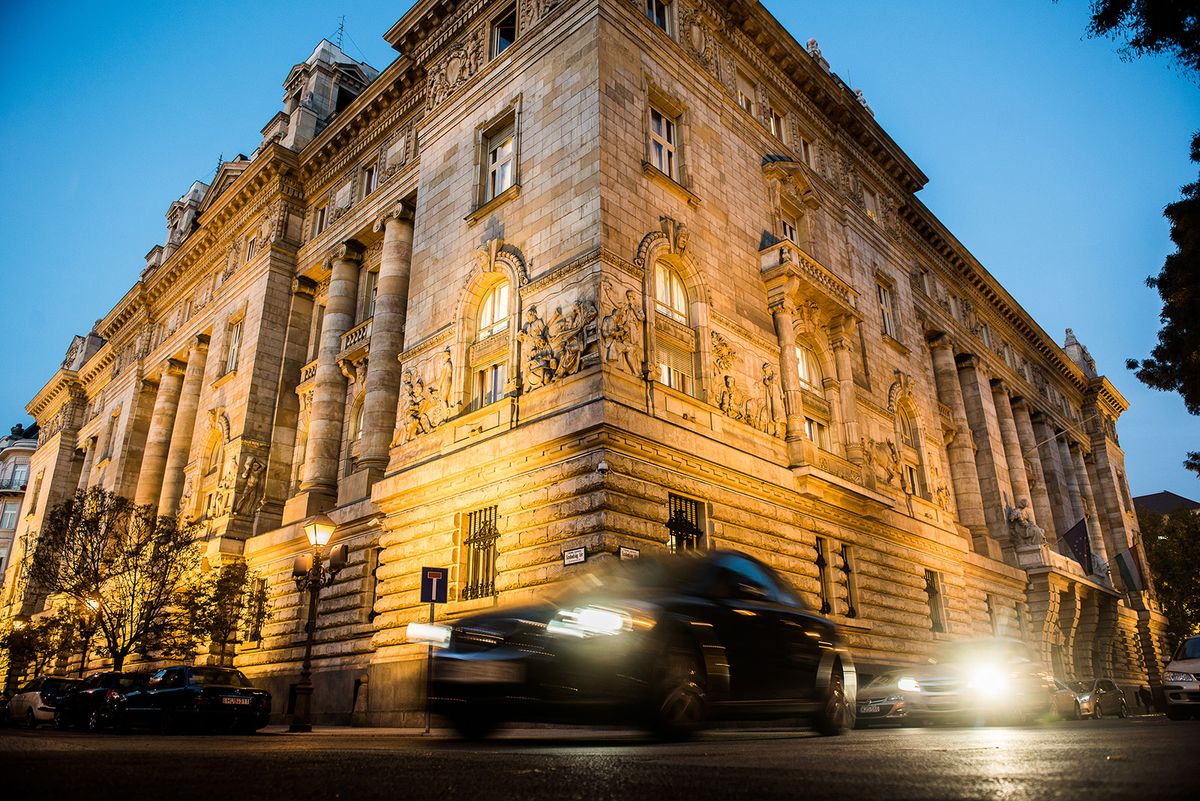 Central Bank Vice President Marton Nagy Presents New Central Banking Program
Traffic drives past the Hungarian central bank, also known as Magyar Nemzeti Bank, in Budapest, Hungary on Tuesday, Nov. 3, 2015. Hungary's central bank has extended its Funding for Growth Plan into 2016, seeking to boost banks' lending via new facilities, according to a National Bank of Hungary statement. Photographer: Akos Stiller/Bloomberg via Getty Images