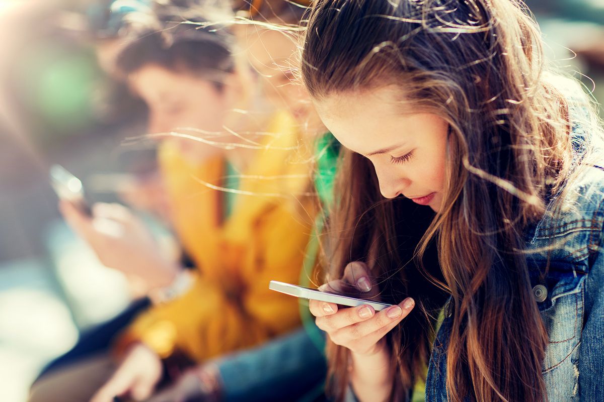 Technology,,Internet,Addiction,And,People,Concept,-,Happy,Teenage,Friends
technology, internet addiction and people concept - happy teenage friends with smartphones outdoors
