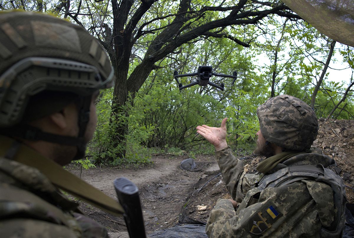 UKRAINE-RUSSIA-CONFLICT-WAR
Ukrainian servicemen of a Reconnaissance team fly a drone at a front line near the town of Bakhmut, Donetsk region on May 8, 2023, amid the Russian invasion of Ukraine. (Photo by Sergey SHESTAK / AFP)