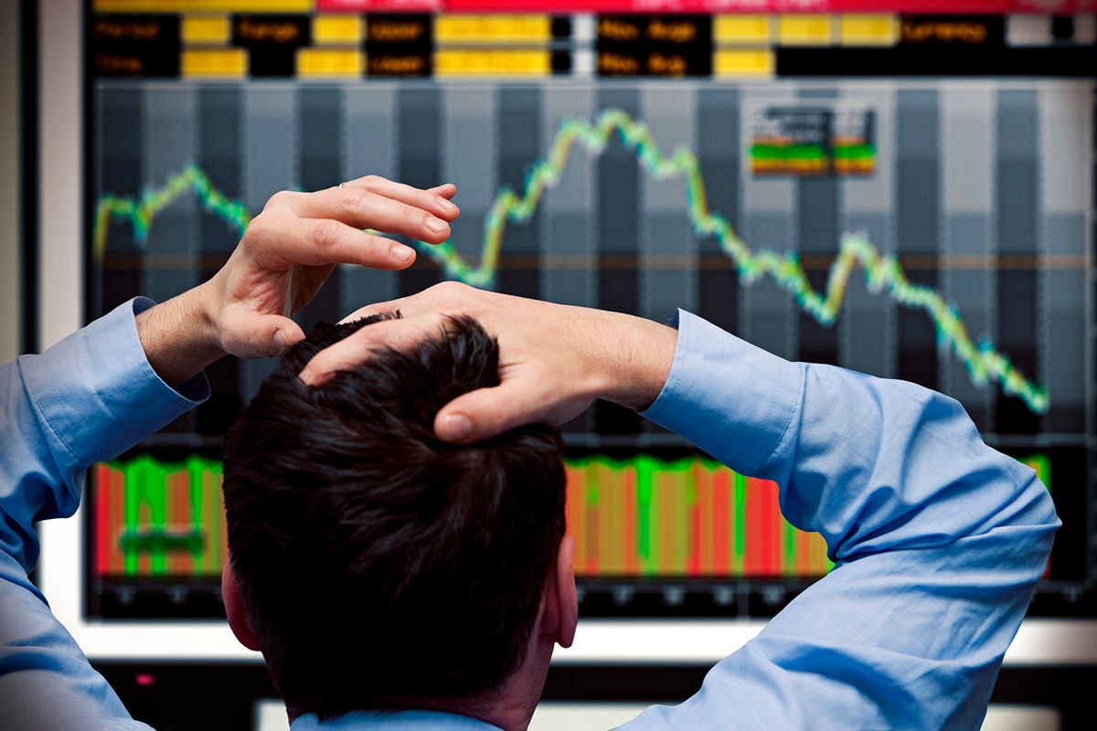 Trader watching stocks crash on screen
Failure, risk taking, work stress