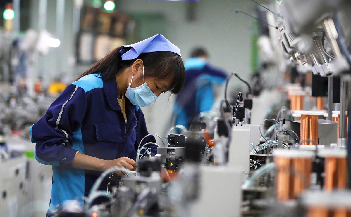 Jiangsu electronic factory produces for overseas orders
Staff at a local electronic factory work to produce to finish overseas orders in time, Sihong district, Suqian city, east China's Jiangsu province, 11 March 2020. (Photo by Xu Changliang / Imaginechina via AFP)
