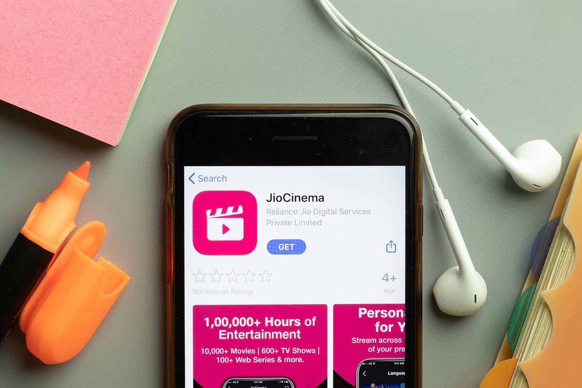 New York, USA - 1 December 2020: JioCinema mobile app icon on phone screen top view, Illustrative Editorial.