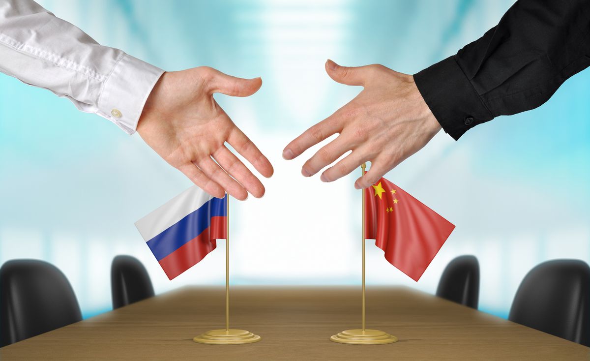 Russia,And,China,Diplomats,Agreeing,On,A,Deal
