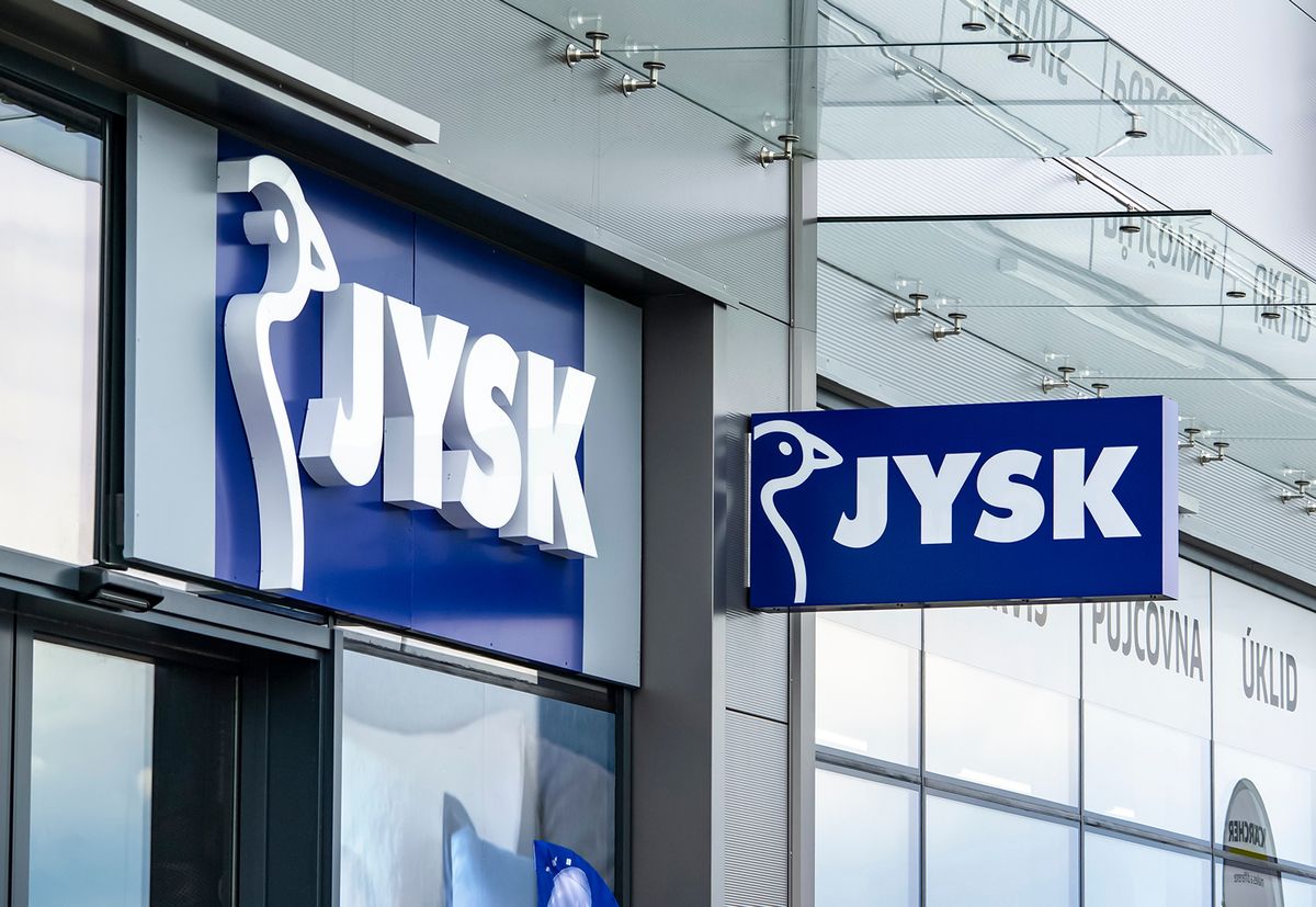 Ostrava,,Czech,Republic,-,May,3,,2021:,The,Banners,Of
OSTRAVA, CZECH REPUBLIC - MAY 3, 2021: The banners of Jysk company above the entrance to the shop where houseware is sold