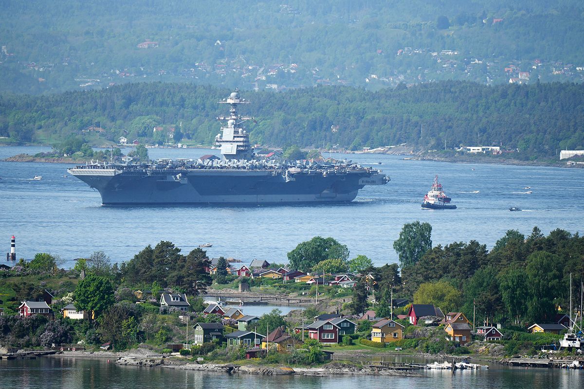NORWAY-RUSSIA-US-WARSHIP
The 337-metre (1,106-foot) USS Gerald R. Ford aircraft carrier of the US Navy is seen in the Oslo Fjord, here seen from Ekebergskrenten in Oslo, Norway, on May 24, 2023. The ship is the world's largest warship and will be in port in Oslo for four days. Russia's embassy in Norway on Tuesday, May 23, 2023 hashly criticised the visit by the US aircraft carrier to Oslo as an "illogical and harmful" show of force. (Photo by Javad Parsa / NTB / AFP) / Norway OUT