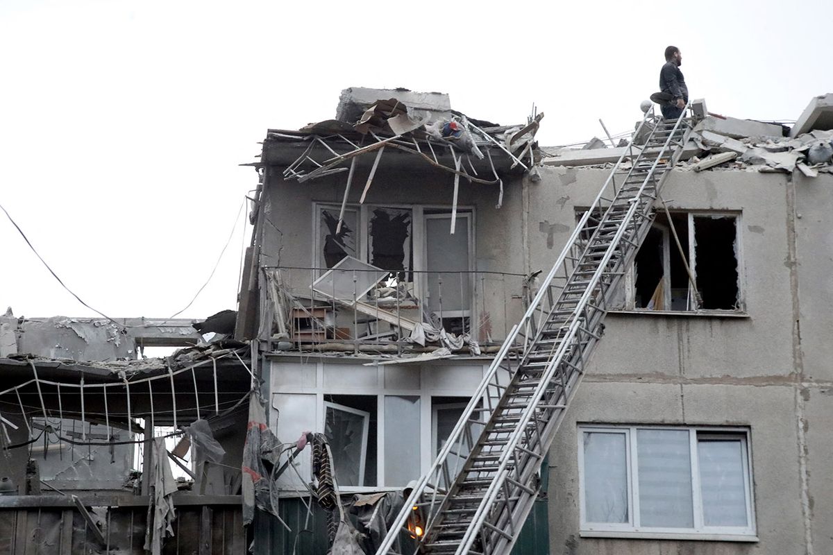 Response effort to Russian missile attack on SlovianskSLOVIANSK, UKRAINE - APRIL 14, 2023 - A five-storey residential building, which was hit by a Russian missile Friday, April 14, lies in ruins, Sloviansk, Donetsk Region, eastern Ukraine. On April 14, 2023, Russian troops launched a massive missile attack on Sloviansk, having fired eight S-300 missiles. Thirty-nine civilians were affected by the enemy attack: 15 of them were killed and 24 injured.NO USE RUSSIA. NO USE BELARUS. (Photo by Yuliia Ovsiannikova / NurPhoto / NurPhoto via AFP)