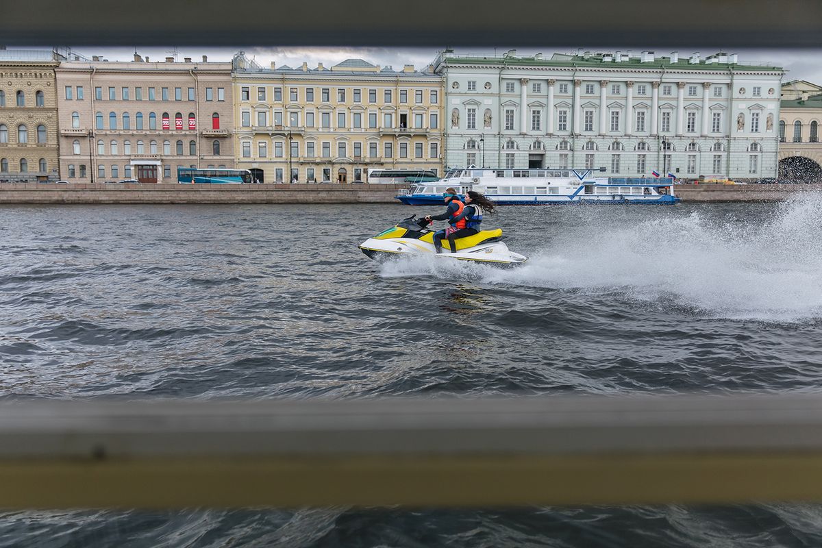 A,Middle-aged,Man,Rides,A,Jet,Ski,On,The,Neva
A middle-aged man rides a jet ski on the Neva River in the center of St. Petersburg. Sunny day. In summer. Russia, Saint Petersburg, 07.20.2020