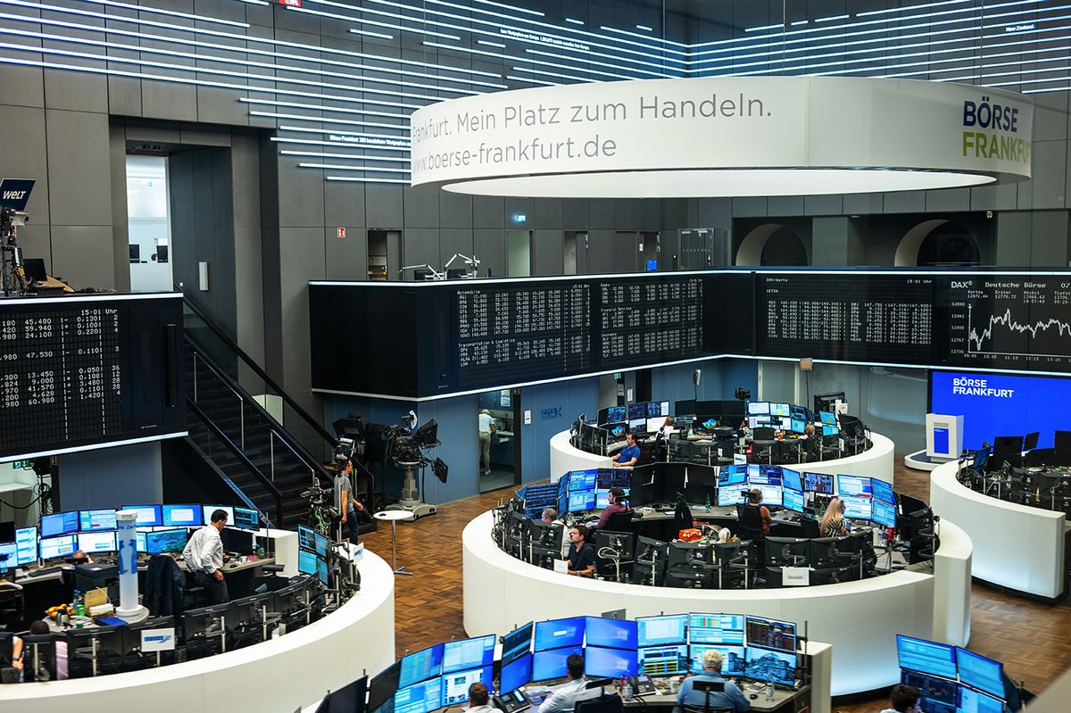 FRANKFURT, GERMANY - SEPTEMBER, 2022: Close view of the main office with multiple screens and workers in the german stock exchange