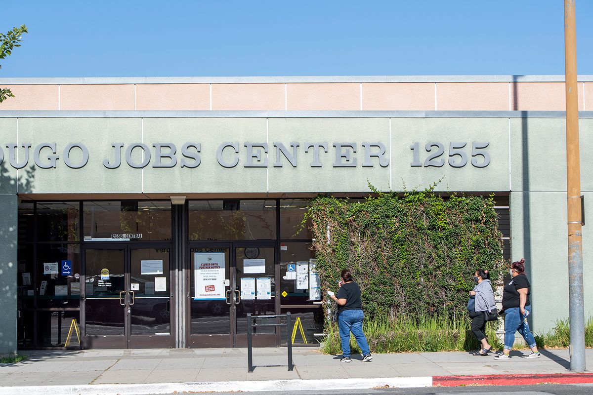 COVID-19 pandemic caused by new coronavirus
A woman walks outside of one of the Glendale Unemployement office closed due to corovirus amid the Covid 19 pandemic on May 4, 2020, in Glendale, California. (Photo by VALERIE MACON / AFP)