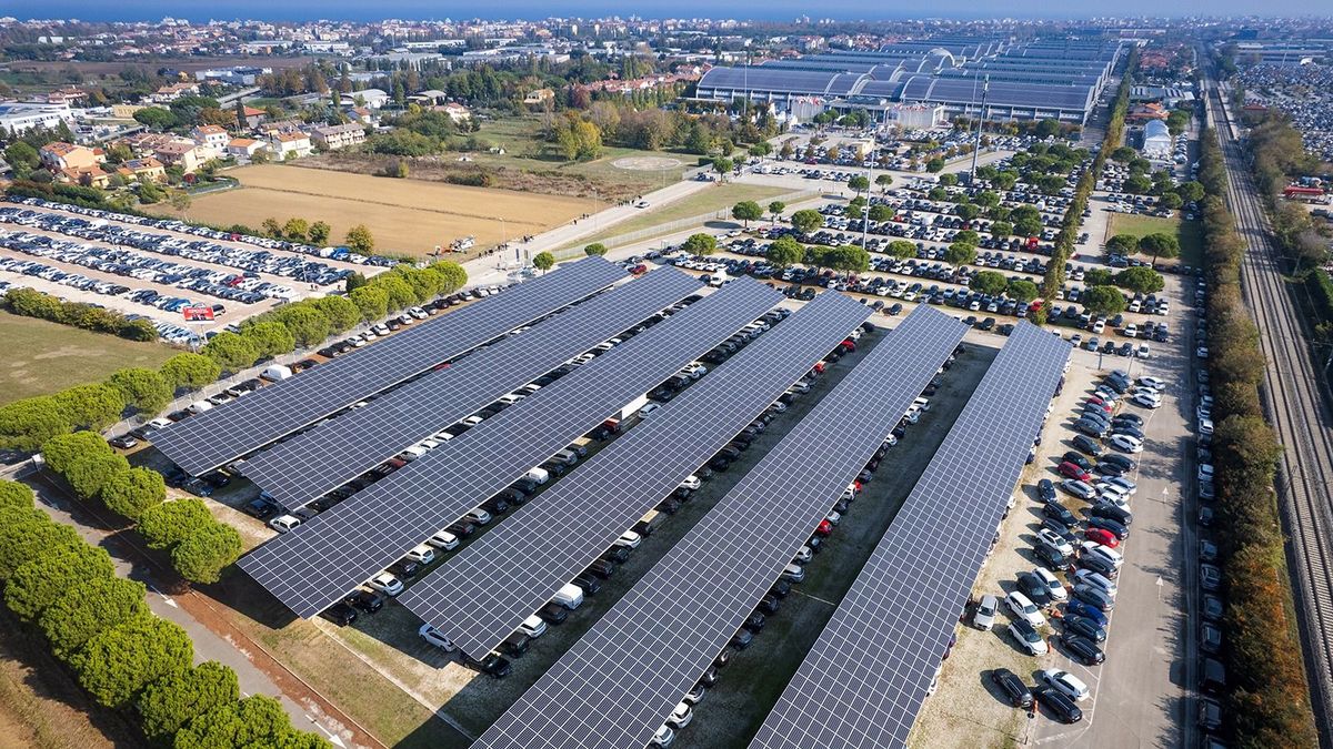 Aerial,View,Of,A,Car,Park,With,Solar,Panels.,Rimini,Aerial view of a car park with solar panels. Rimini, Italy - October 2021