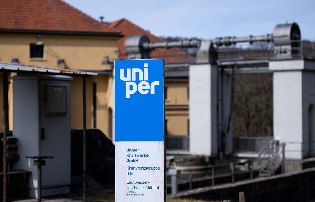 Mühltal hydroelectric power station 17 March 2023, Bavaria, Straßlach-Dingharting: A sign with the "uniper" logo stands at the Mühltal hydropower plant on the Isar River. In view of the energy crisis, more than two-thirds of people in Bavaria would like to see more involvement by the state in energy supply, according to a representative survey. Photo: Sven Hoppe/dpa (Photo by SVEN HOPPE / DPA / dpa Picture-Alliance via AFP)