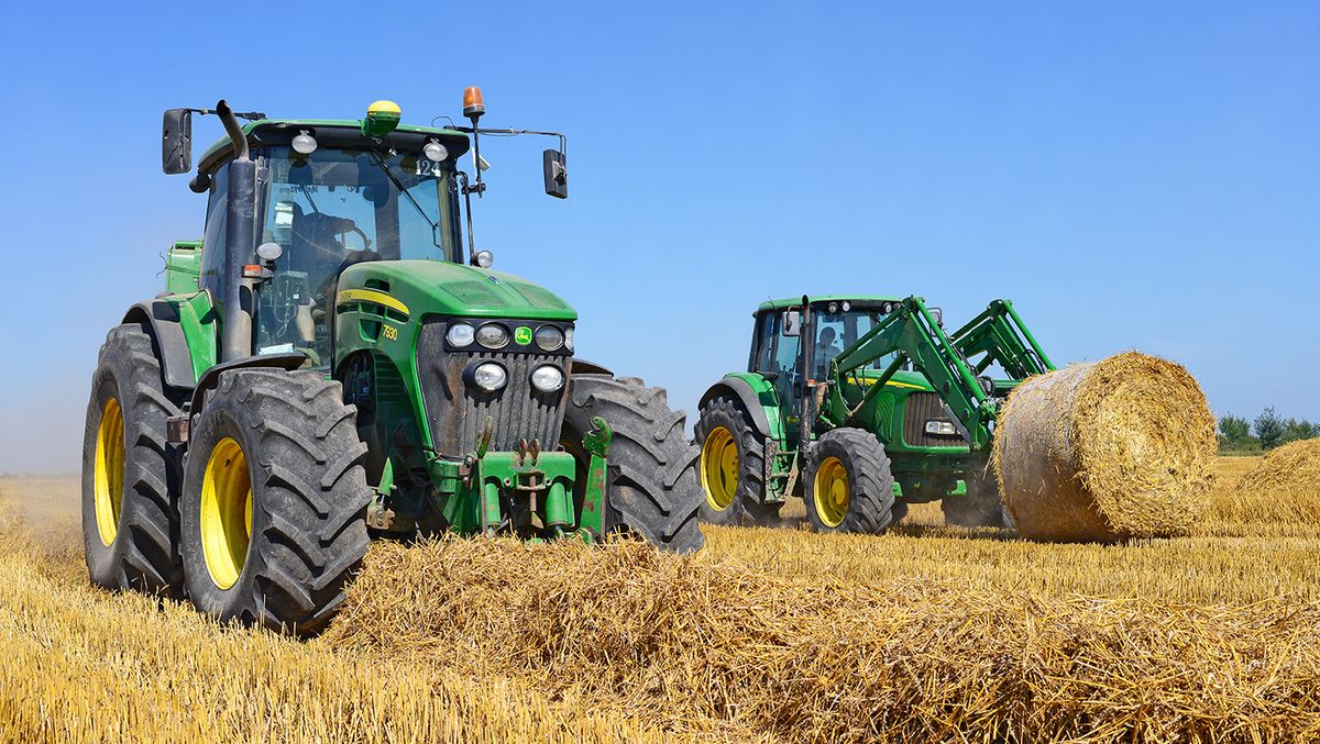 Kalush,,Ukraine,-,July,28:,Universal,Tractor,Harvesting,Straw,In