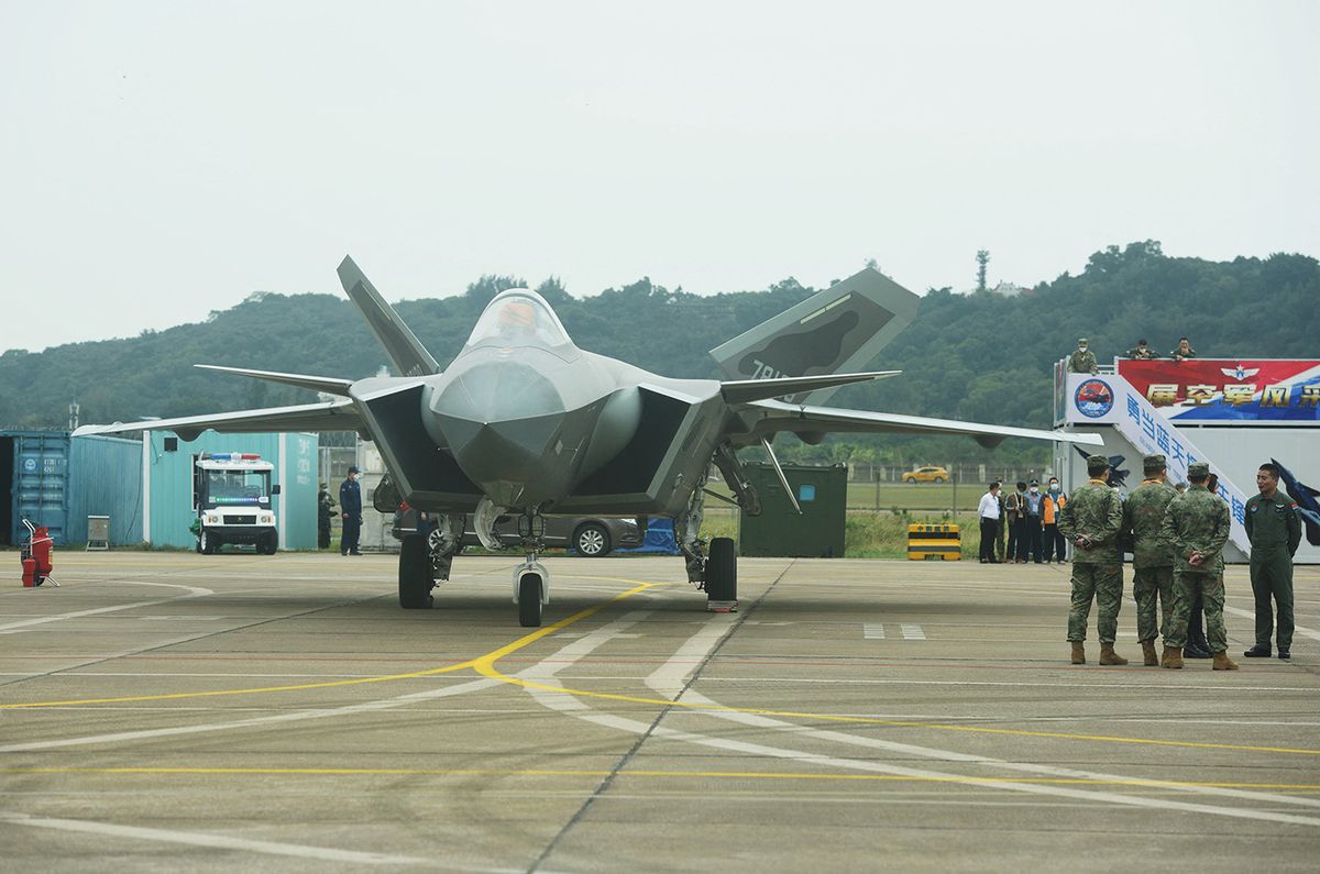 ZHUHAI, CHINA - NOVEMBER 8, 2022 - The Chengdu J-20 stealth fighter jet is on static display at the Airshow China in Zhuhai, Guangdong province, China, November 8, 2022. (Photo by Costfoto/NurPhoto) (Photo by CFOTO / NurPhoto / NurPhoto via AFP)