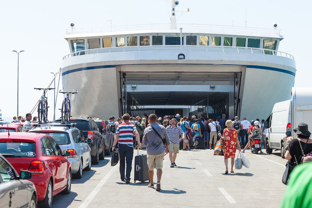Split,,Croatia,-,August,4,,2012:,People,Boarding,The,Ferry