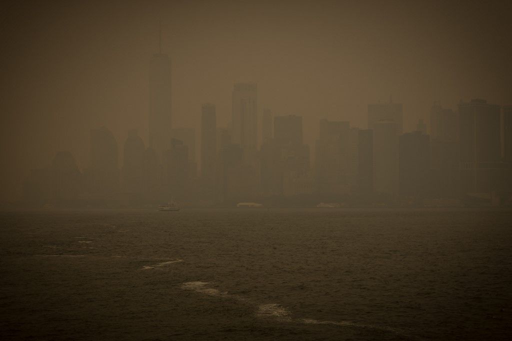 Manhattan Island is seen in low visibility smoke from the wildfires in Canada hits New York, the United States