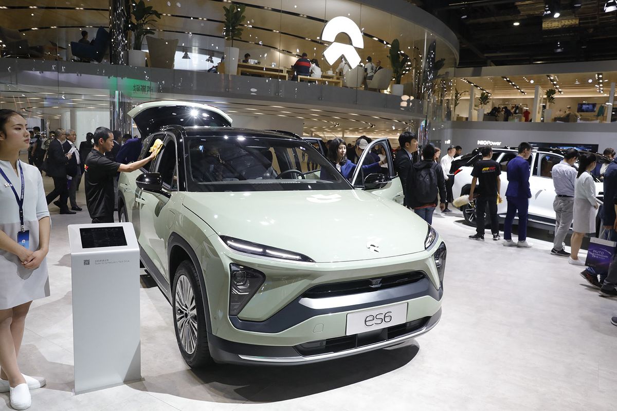 Chinese EV maker NIO extends gains on upbeat delivery outlook for Q2
--FILE--People visit the stand of NIO during the 18th Shanghai International Automobile Industry Exhibition, also known as Auto Shanghai 2019, in Shanghai, China, 17 April 2019.NIO Inc., a leading Chinese electric vehicle (EV) manufacturer, saw its shares reaping solid gains throughout Tuesday, after the company reported upbeat EV delivery readings for the first two months of the second quarter (Q2). (Photo by dycj / Imaginechina / Imaginechina via AFP)