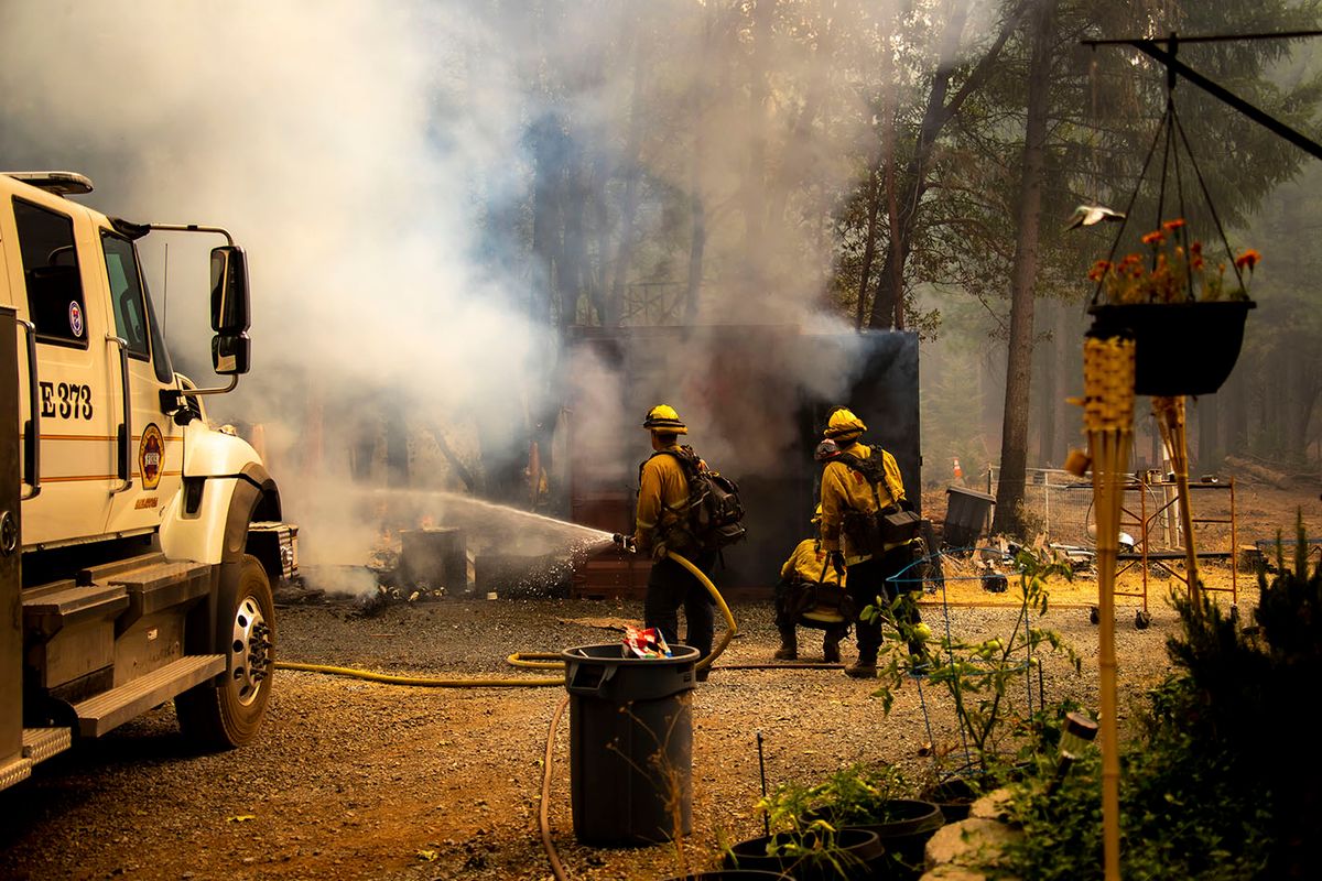 U.S.-LAKE TAHOE-FOREST FIRE(220910) -- LAKE TAHOE, Sept. 10, 2022 (Xinhua) -- Firefighters attempt to extinguish a fire in the forests near Lake Tahoe in north California, the United States, on Sept. 9, 2022. Multiple forest fires took place recently due to hot and dry weather in California. (Photo by Dong Xudong/Xinhua)Xinhua News Agency / eyevineContact eyevine for more information about using this image:T: +44 (0) 20 8709 8709E: info@eyevine.comhttp://www.eyevine.com