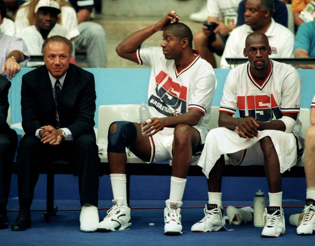 Dream Team Wins Gold in 1992Aug 06, 1992; Barcelona, SPAIN; NBA stars EARVIN "Magic" JOHNSON (center) and MICHAEL JORDAN look on from the bench, along with assistant coach LENNY WILKENS, during their semifinal victory over Lithuania at the 1992 Summer Olympics. The U.S. beat Lithuania 127-76 and would defeat Croatia two days later to win the gold medal. It was the first time in the history of the Olympics that professional players from the NBA were allowed to participate in what was dubbed the 'Dream Team.'
Mandatory Credit: Photo by Gregg Newton/ZUMA Press.
(©) Copyright 1992 by Gregg NewtonNBA stars Earvin "Magic" Johnson (center) and Michael Jordan look on from the bench, along with assistant coach Lenny Wilkens, during their semifinal victory over Lithuania, at the Summer Olympics in Barcelona, Spain on August 6, 1992. The U.S. defeated Lithuania 127-76 and would defeat Croatia two days later to win the gold medal. It was the first time in the history of the Olympics that professional players from the NBA were allowed to participate in what was dubbed the "dream team."    Photo by Gregg Newton