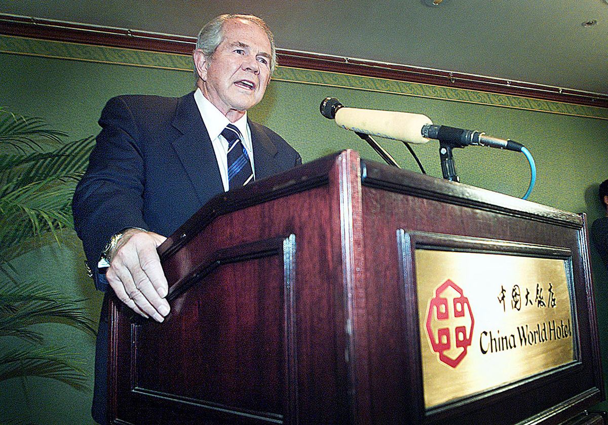 American religious leader Pat Robertson, founder and chairman of the Christian Broadcasting Network (CBN), speaks at a press conference, 28 November 2001, in Beijing.  Robertson, whose network CBN currently produces value-based programming seen in more than 150 countries in 64 languages, met with Chinese leaders to seek a better understanding on how CBN could help strenghthen relations between the United States and China.   AFP PHOTO/Frederic J. BROWN (Photo by FREDERIC BROWN / AFP)